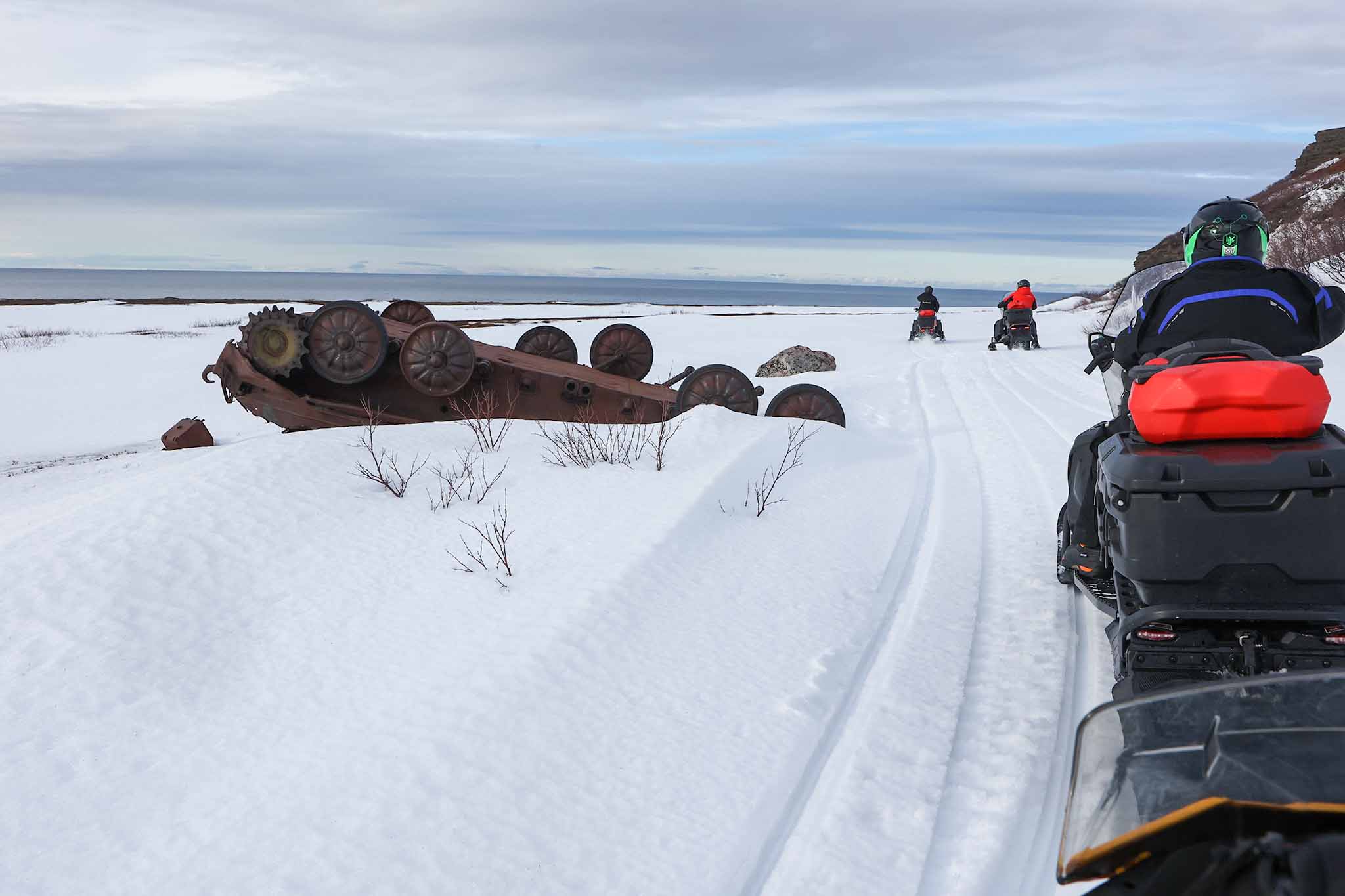 Перевернутый БТР на побережье.